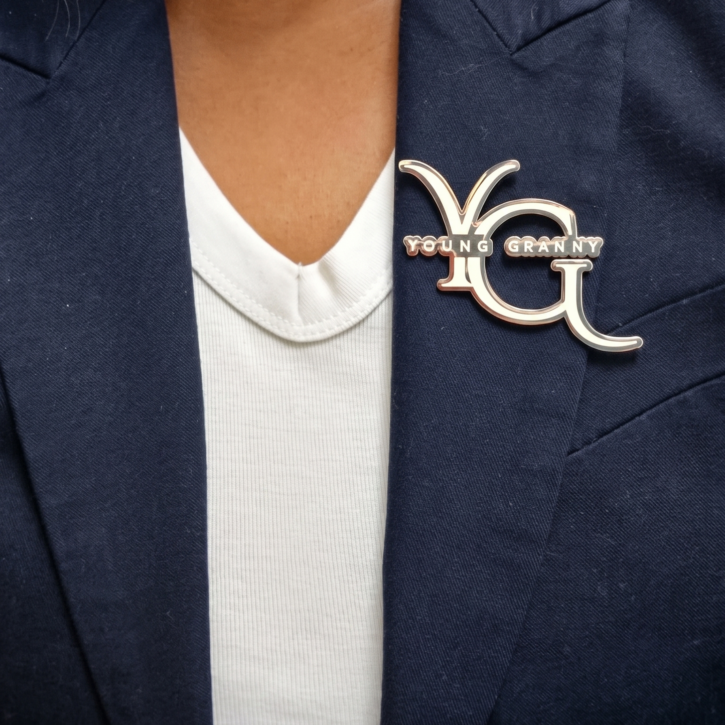 YG Wearing YG Silver Brooch Close-Up